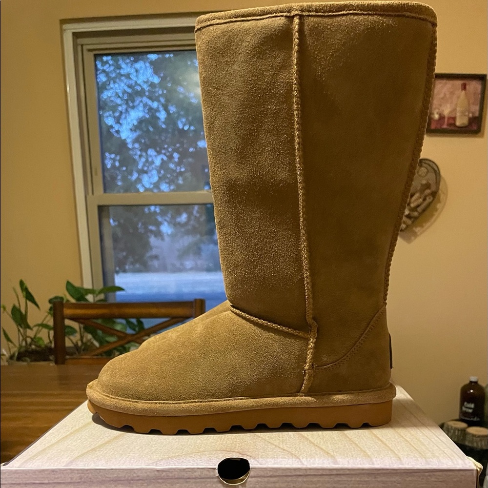 Women’s Elle Tall Water Resistant Boot Size 7 New with box never worn.